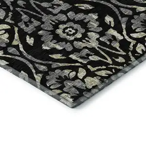 Photo of Black Gray And Beige Floral Washable Area Rug With UV Protection