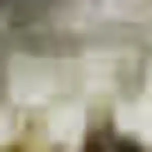 Photo of Black Gray And Brown Abstract Washable Area Rug With UV Protection