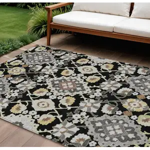 Photo of Black Gray And Brown Oriental Washable Indoor Outdoor Area Rug