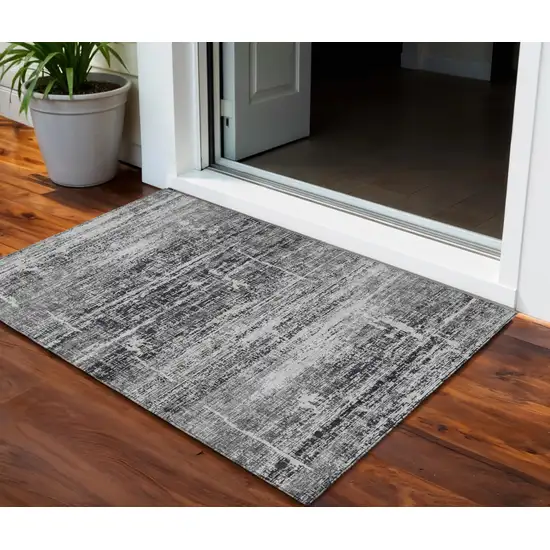 Black Gray And Charcoal Abstract Washable Indoor Outdoor Area Rug Photo 1