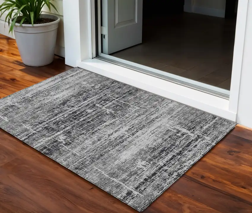 Black Gray And Charcoal Abstract Washable Indoor Outdoor Area Rug Photo 1