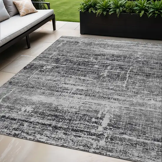 Black Gray And Charcoal Abstract Washable Indoor Outdoor Area Rug Photo 1