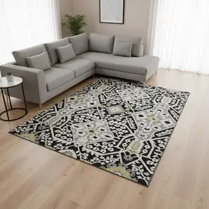 Photo of Black Gray And Gold Floral Washable Area Rug With UV Protection