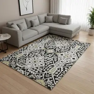 Photo of Black Gray And Gold Floral Washable Area Rug With UV Protection
