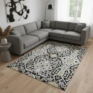 Photo of Black Gray And Gold Floral Washable Area Rug With UV Protection