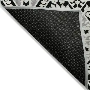 Photo of Black Gray And Gold Floral Washable Indoor Outdoor Area Rug