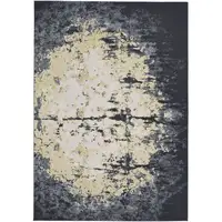 Photo of Black Gray And Gold Geometric Stain Resistant Area Rug