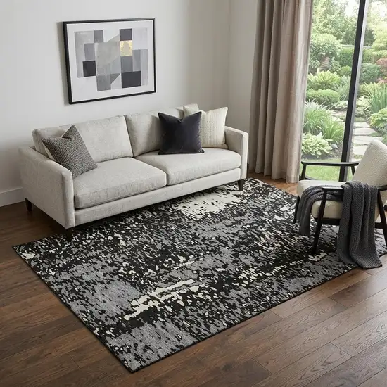 Black Gray And Ivory Abstract Washable Area Rug With UV Protection Photo 1