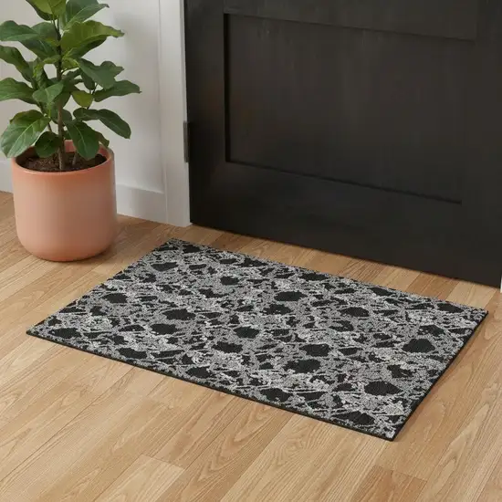 Black Gray And Ivory Abstract Washable Area Rug With UV Protection Photo 1
