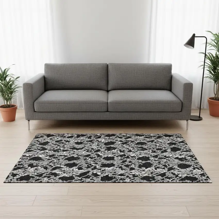 Black Gray And Ivory Abstract Washable Area Rug With UV Protection Photo 2
