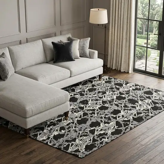 Black Gray And Ivory Abstract Washable Area Rug With UV Protection Photo 1