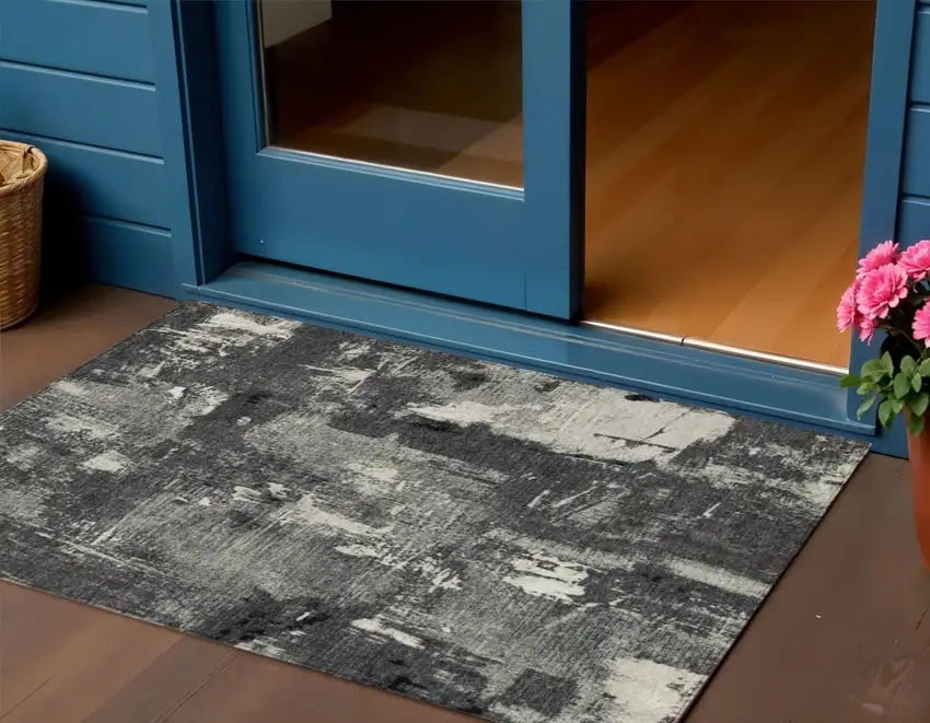 Black Gray And Ivory Abstract Washable Indoor Outdoor Area Rug Photo 1