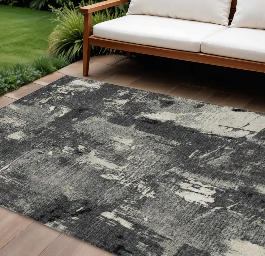 Black Gray And Ivory Abstract Washable Indoor Outdoor Area Rug Photo 1