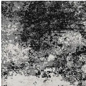 Photo of Black Gray And Ivory Abstract Washable Indoor Outdoor Area Rug