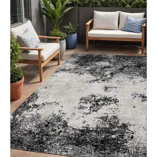 Black Gray And Ivory Abstract Washable Indoor Outdoor Area Rug Photo 1