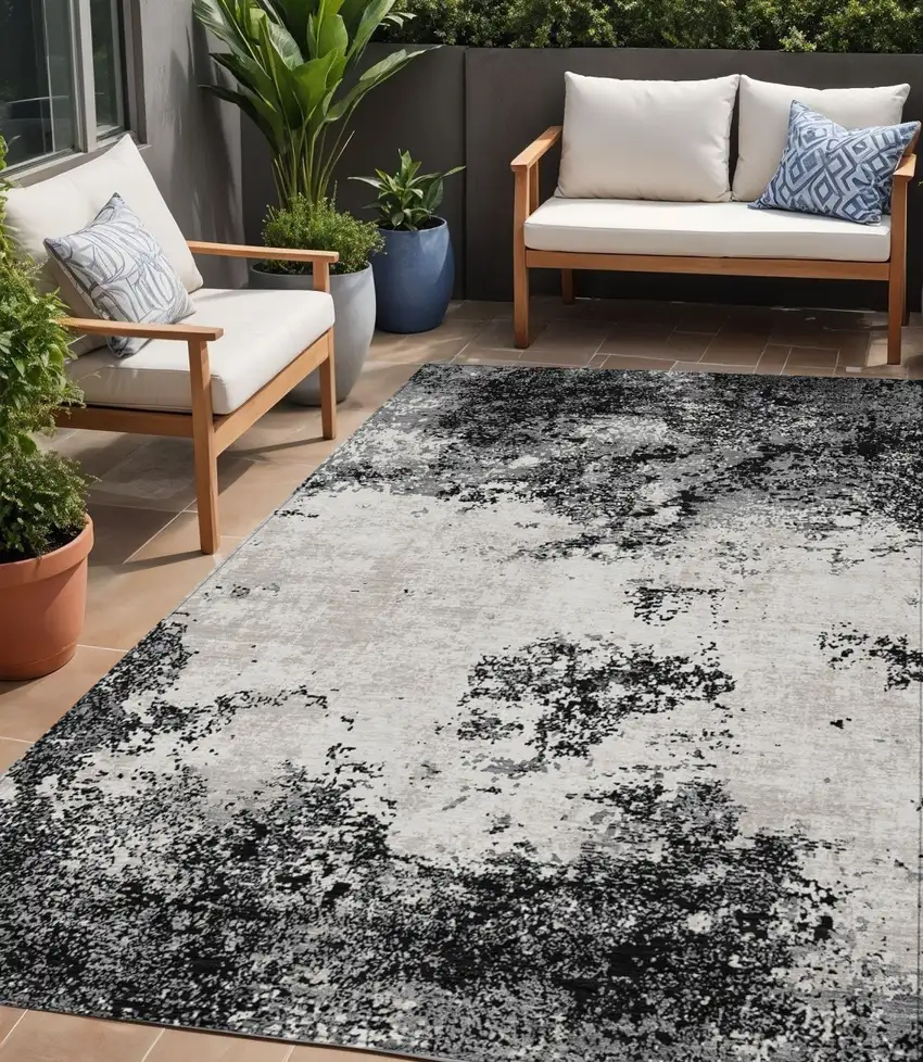 Black Gray And Ivory Abstract Washable Indoor Outdoor Area Rug Photo 1