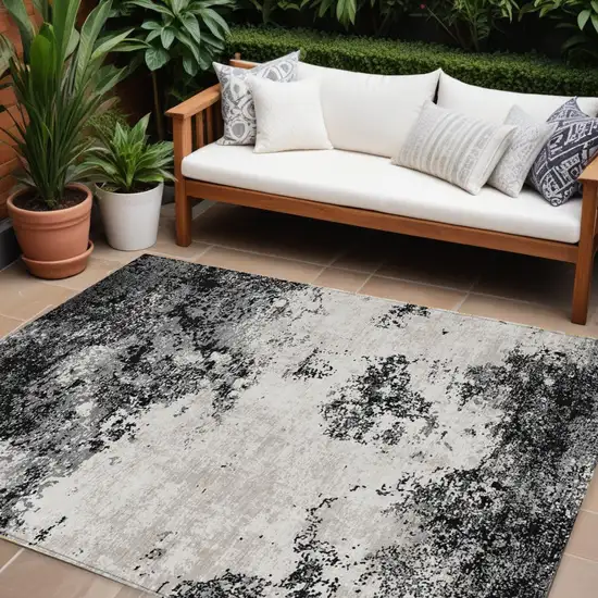 Black Gray And Ivory Abstract Washable Indoor Outdoor Area Rug Photo 1
