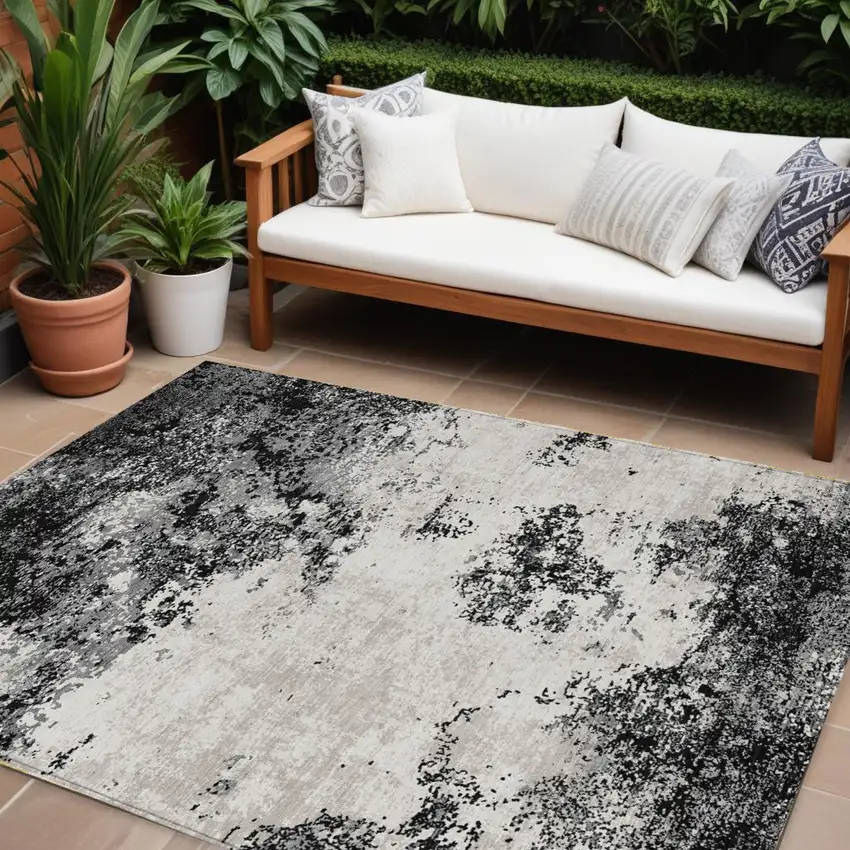 Black Gray And Ivory Abstract Washable Indoor Outdoor Area Rug Photo 1