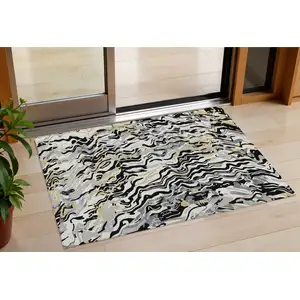 Photo of Black Gray And Ivory Abstract Washable Indoor Outdoor Area Rug