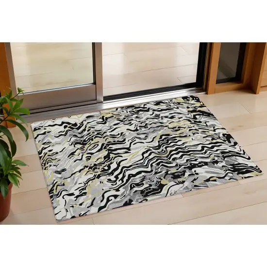Black Gray And Ivory Abstract Washable Indoor Outdoor Area Rug Photo 1