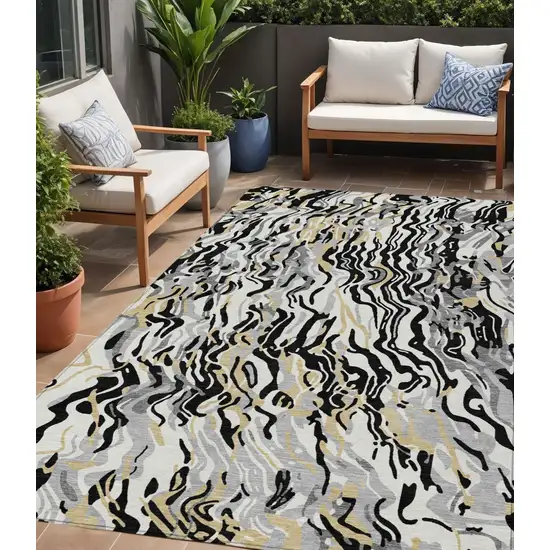 Black Gray And Ivory Abstract Washable Indoor Outdoor Area Rug Photo 1