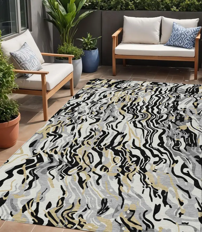 Black Gray And Ivory Abstract Washable Indoor Outdoor Area Rug Photo 1