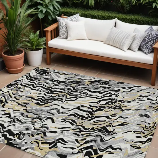 Black Gray And Ivory Abstract Washable Indoor Outdoor Area Rug Photo 1