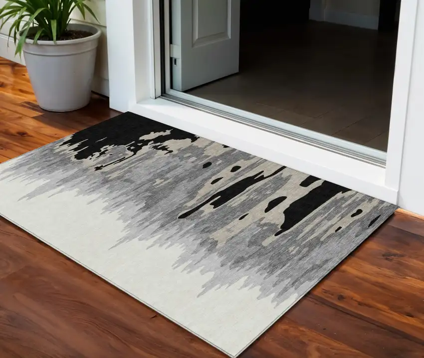 Black Gray And Ivory Abstract Washable Indoor Outdoor Area Rug Photo 1