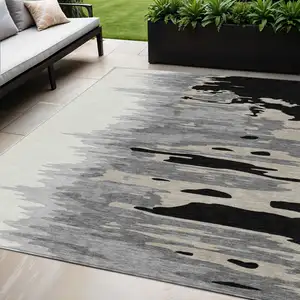 Photo of Black Gray And Ivory Abstract Washable Indoor Outdoor Area Rug