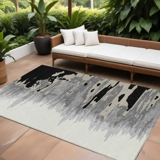 Black Gray And Ivory Abstract Washable Indoor Outdoor Area Rug Photo 1
