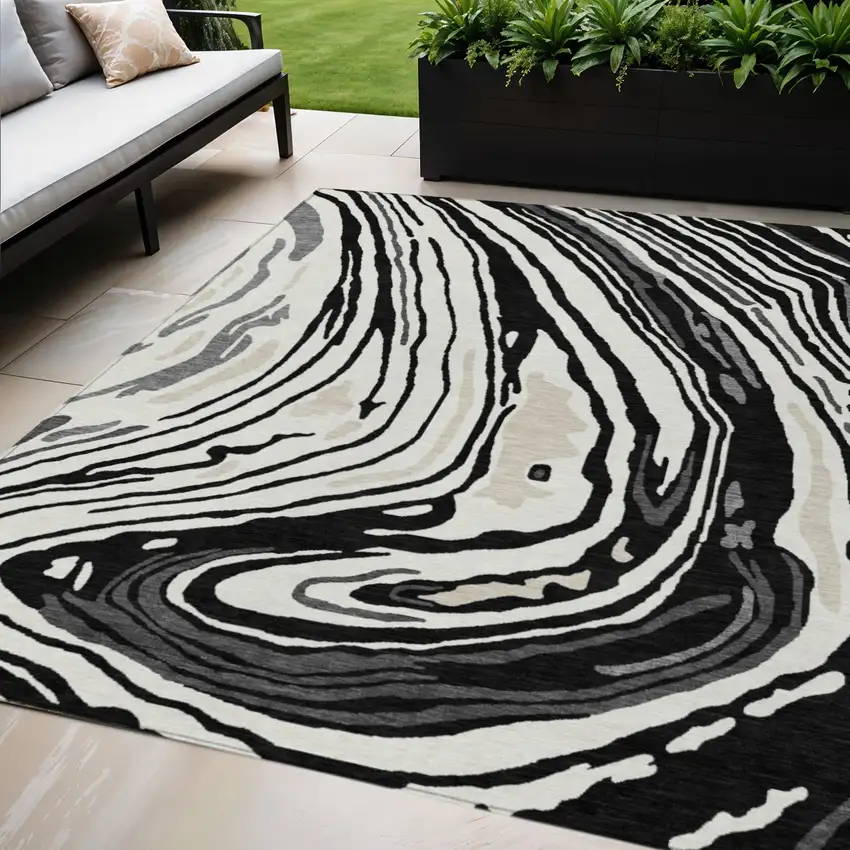 Black Gray And Ivory Abstract Washable Indoor Outdoor Area Rug Photo 1