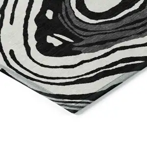 Photo of Black Gray And Ivory Abstract Washable Indoor Outdoor Area Rug