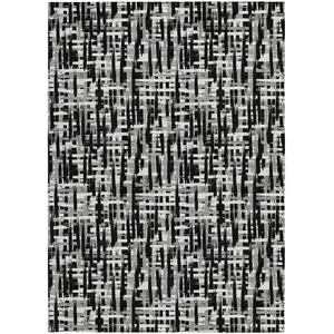 Photo of Black Gray And Ivory Abstract Washable Indoor Outdoor Area Rug