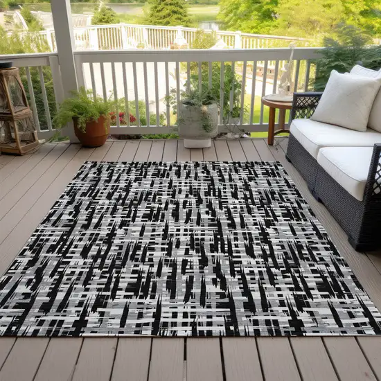 Black Gray And Ivory Abstract Washable Indoor Outdoor Area Rug Photo 8