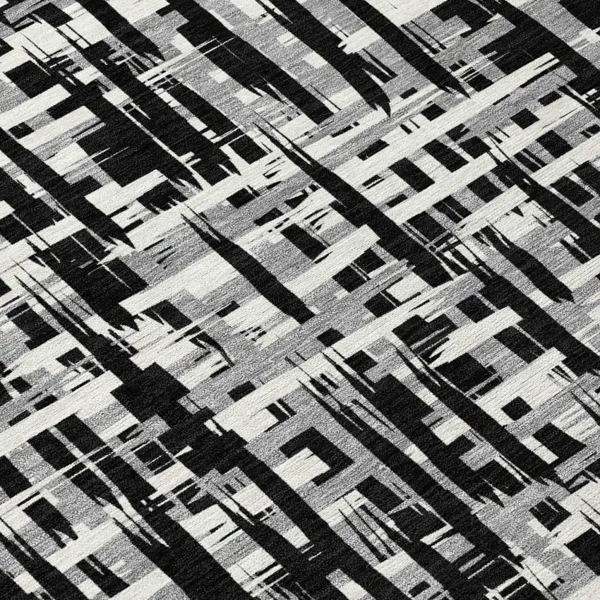 Black Gray And Ivory Abstract Washable Indoor Outdoor Area Rug Photo 3