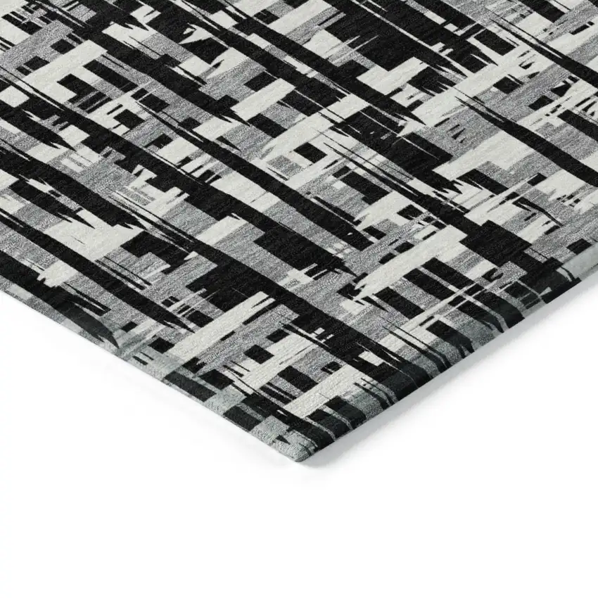 Black Gray And Ivory Abstract Washable Indoor Outdoor Area Rug Photo 5