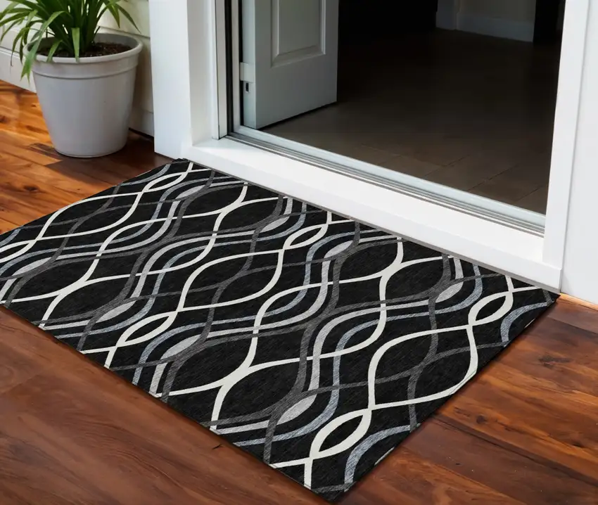 Black Gray And Ivory Abstract Washable Indoor Outdoor Area Rug Photo 1