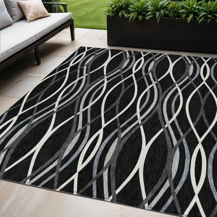 Black Gray And Ivory Abstract Washable Indoor Outdoor Area Rug Photo 1