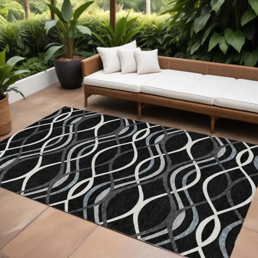 Black Gray And Ivory Abstract Washable Indoor Outdoor Area Rug Photo 1