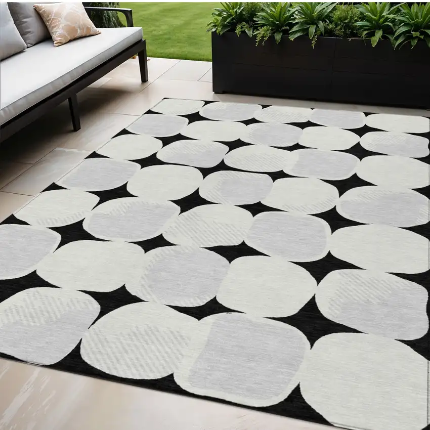 Black Gray And Ivory Abstract Washable Indoor Outdoor Area Rug Photo 1