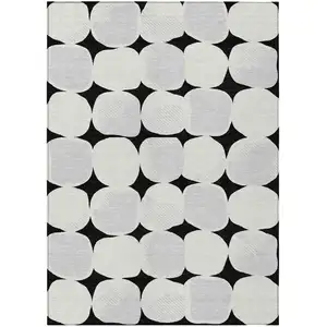 Photo of Black Gray And Ivory Abstract Washable Indoor Outdoor Area Rug
