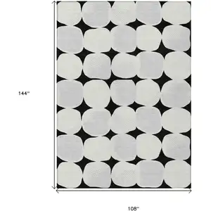Photo of Black Gray And Ivory Abstract Washable Indoor Outdoor Area Rug