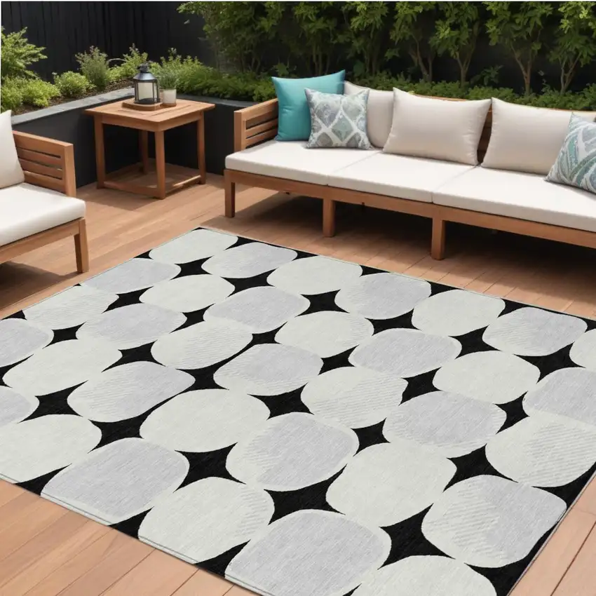 Black Gray And Ivory Abstract Washable Indoor Outdoor Area Rug Photo 1