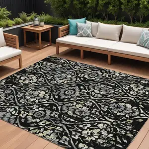 Photo of Black Gray And Ivory Floral Washable Indoor Outdoor Area Rug