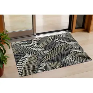Photo of Black Gray And Ivory Floral Washable Indoor Outdoor Area Rug