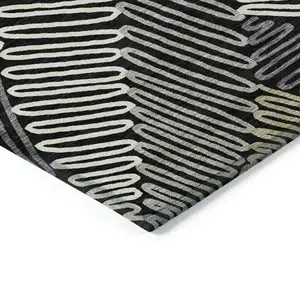 Photo of Black Gray And Ivory Floral Washable Indoor Outdoor Area Rug