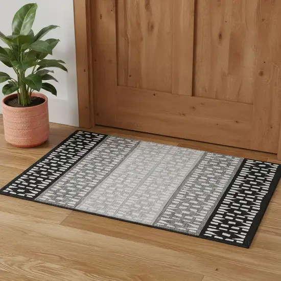 Black Gray And Ivory Geometric Washable Area Rug With UV Protection Photo 1