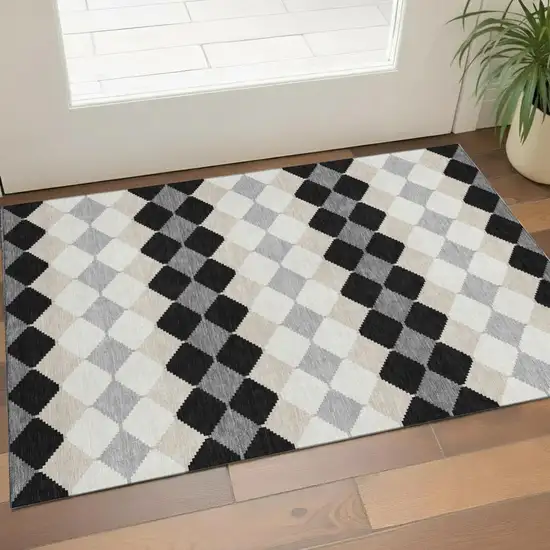 Black Gray And Ivory Geometric Washable Area Rug With UV Protection Photo 1