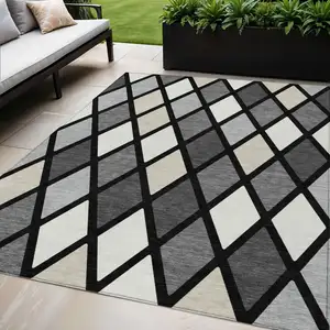 Photo of Black Gray And Ivory Geometric Washable Indoor Outdoor Area Rug