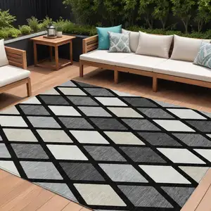 Photo of Black Gray And Ivory Geometric Washable Indoor Outdoor Area Rug